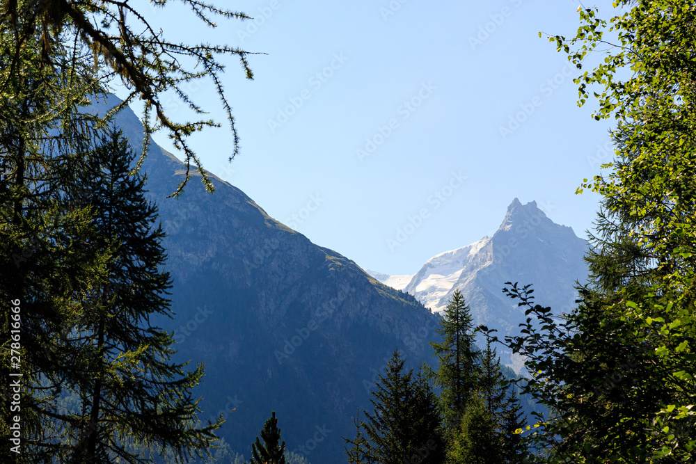 View on the famous peaks of mountain Besso (3667m / 12034ft) in the Pennine Alps in the Swiss canton of Valais in summer. Zinal, Val d'Anniviers, Switzerland