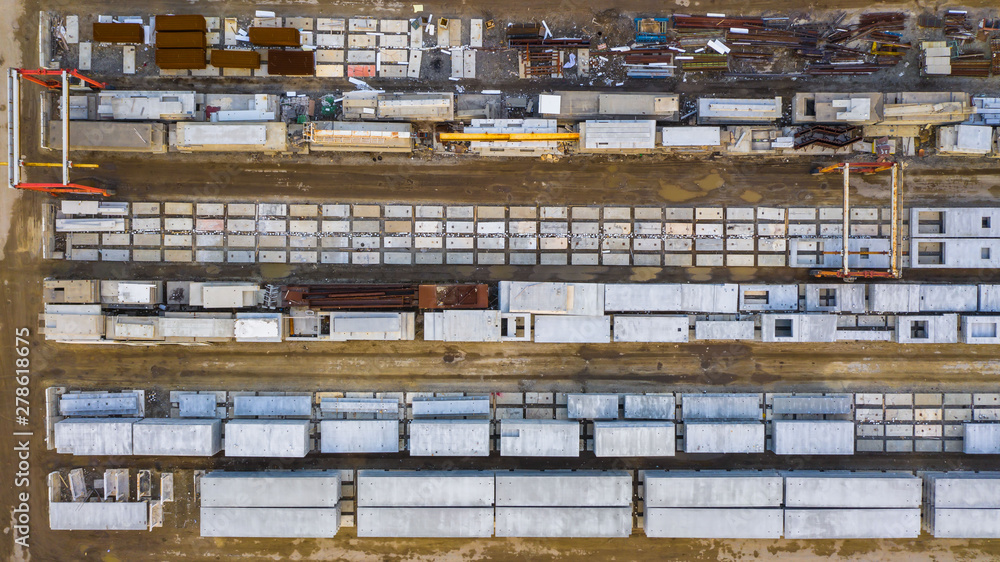 Aerial view of finished concrete slabs and related products at a concrete manufacturing facility in the afternoon sun in Aurora, IL, USA Aerial view of finished concrete slabs and related products at a concrete manufacturing facility in the afternoon sun in Aurora, IL, USA