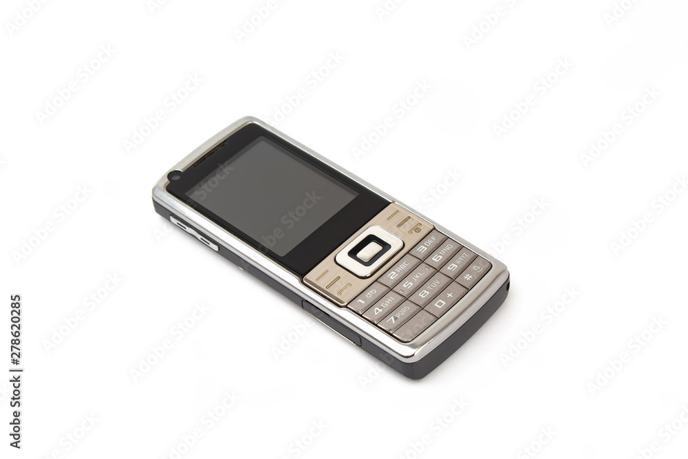 Old silver mobile phone isolated on white background. Old silver mobile phone isolated on white background.