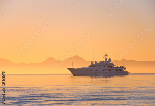 Принти на полотні Silhouette of a luxurious yacht on the sea of cortez at sunset