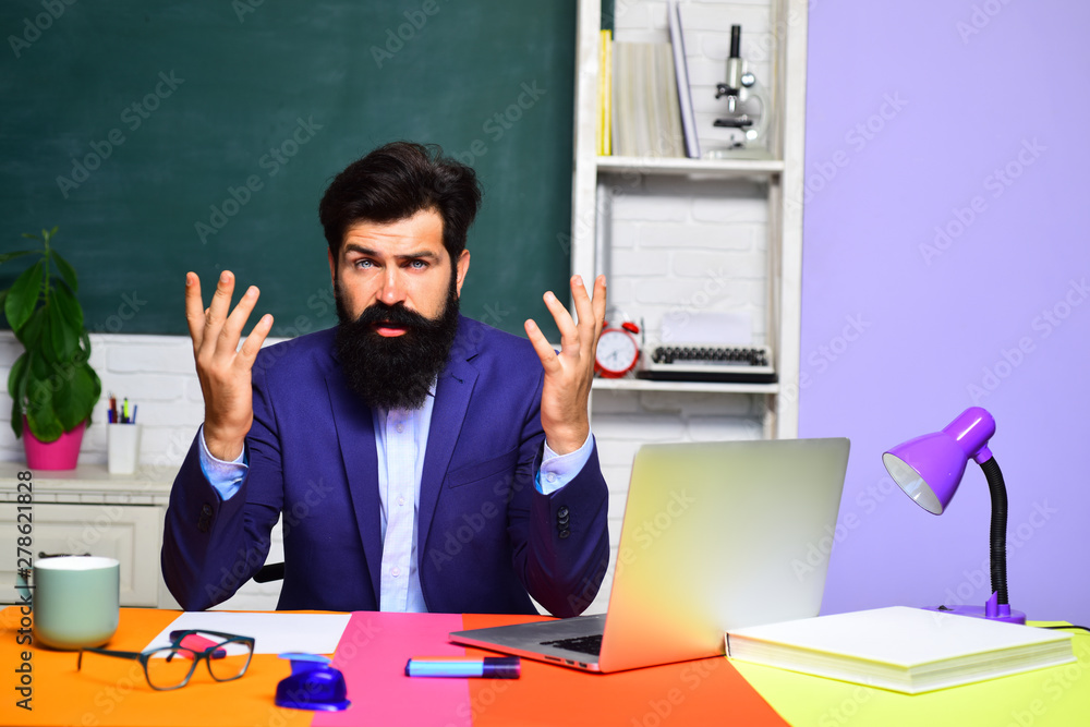 Knowledge and educational school concept. Happy male student studying in school. Good teachers enjoy teaching. Bearded professor at school lesson in classroom. Teacher is skilled leader. Teachers day. Knowledge and educational school concept. Happy male student studying in school. Good teachers enjoy teaching. Bearded professor at school lesson in classroom. Teacher is skilled leader. Teachers day.