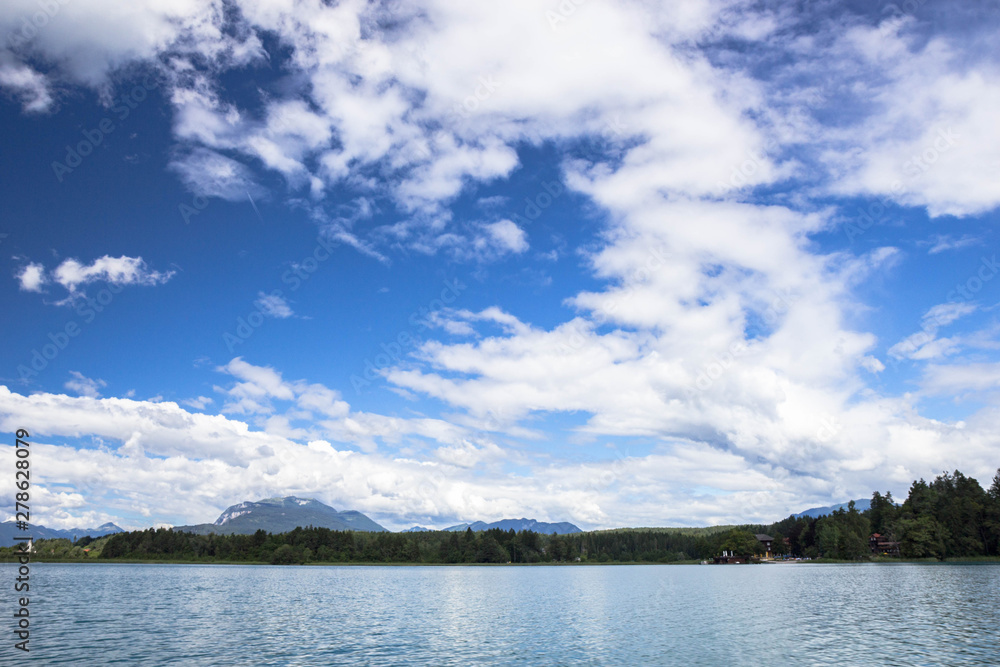 sky over Faaker see in Ausrian Alps, Carinthia region sky over Faaker see in Ausrian Alps, Carinthia region