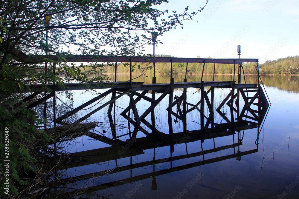 Footbridge on the shore of the lake