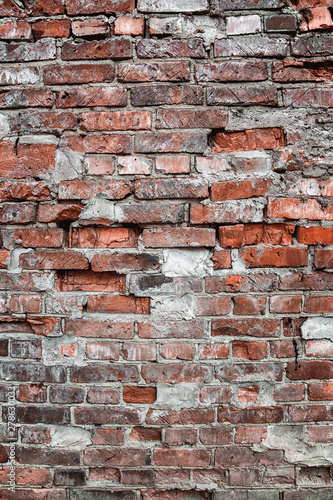 Wall or fence of old red brick. Background