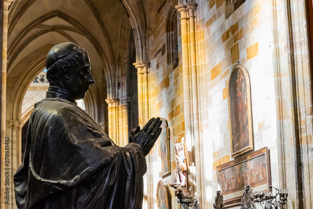 Naklejka premium Priest sculpture in bronze