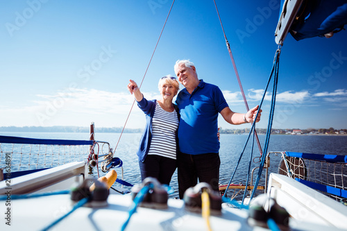 Couple relaxing in sailboat during summer vacation © Snapic.PhotoProduct