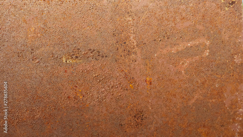 texture of red rust on brown paint
