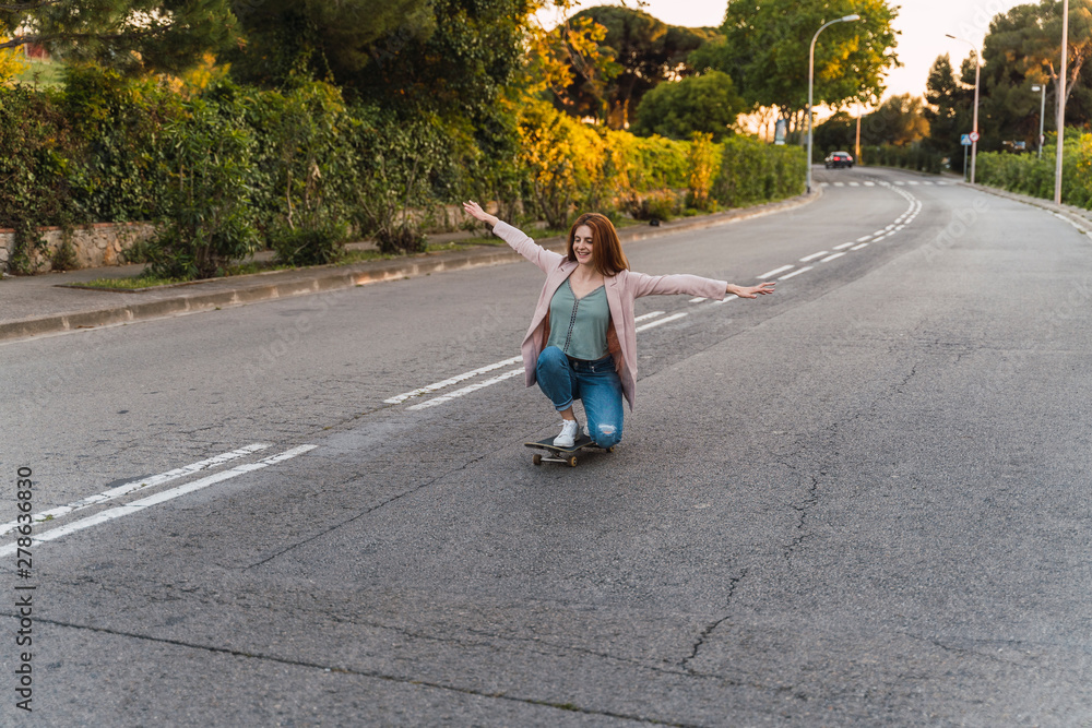 Young woman on skateboard