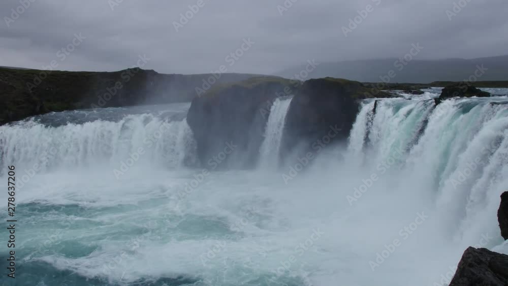 Godafoss waterfall on cloudy, rainy day, Iceland. Godafoss waterfall on cloudy, rainy day, Iceland.