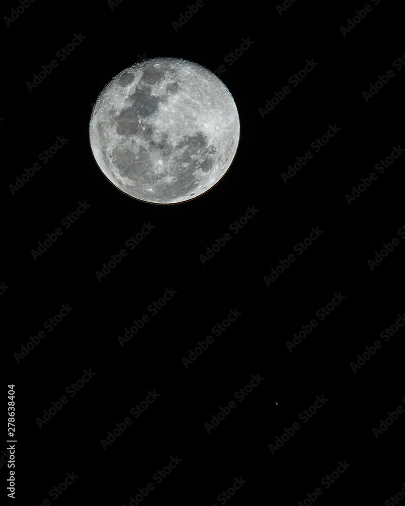 An amazing astronomy event, Saturn covered by the Moon surface awe night sky view from Santiago, Chile, polluted skies with an advanced amateur telescope. Saturn and its rings eclipse by the Moon An amazing astronomy event, Saturn covered by the Moon surface awe night sky view from Santiago, Chile, polluted skies with an advanced amateur telescope. Saturn and its rings eclipse by the Moon
