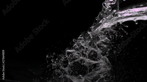 isolated water splash on black backdrop wide shot v04 photo