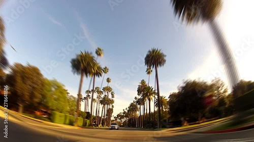 Fast Motion Driving In Suburban Beverly Hills California With Palm Trees