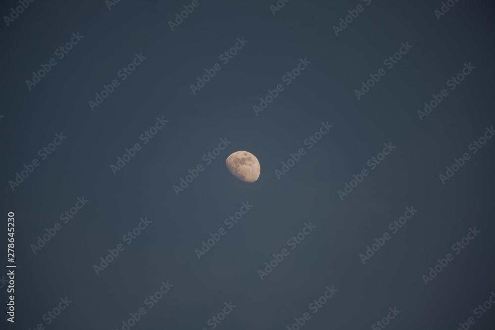 blue moon and blue sky with pretty good colors in the sky