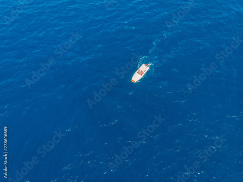 Luxury speed motor boat blue water. Aerial view © Parilov