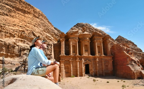Couple in Ad Deir the Monastery Temple in Petra, Jordan