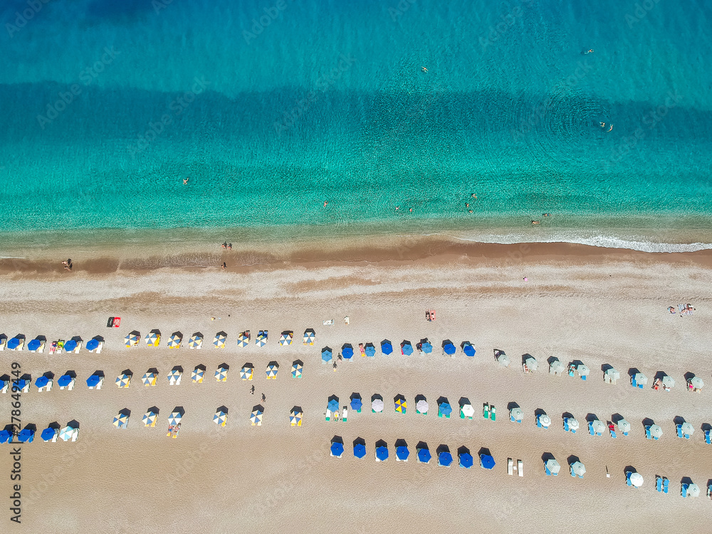 Aerial birds eye view drone photo of Elli beach on Rhodes city island, Dodecanese, Greece. Panorama with nice sand, lagoon and clear blue water. Famous tourist destination in South Europe - obrazy, fototapety, plakaty 