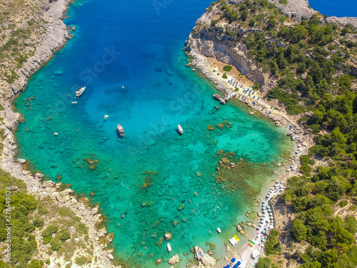 Aerial birds eye view drone photo Anthony Quinn near Ladiko bay on Rhodes island, Dodecanese, Greece. Panorama with nice lagoon and clear blue water. Famous tourist destination in South Europe