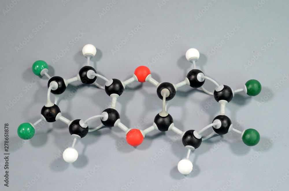 Obraz premium Molecule model of Dioxine. Black is Carbon, red is Oxygen, green is Chlor, white is Hydrogen