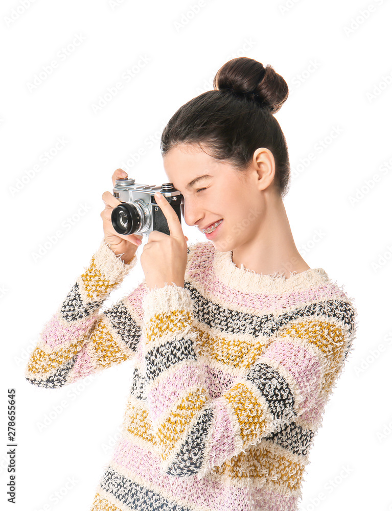 Young girl with photo camera on white background Young girl with photo camera on white background