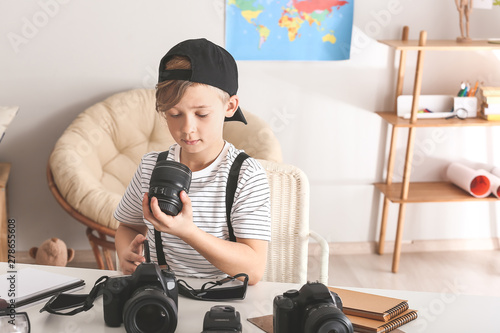 Cute little photographer wi...