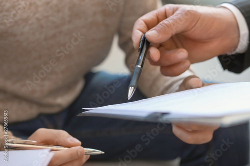 Notary public showing clien...
