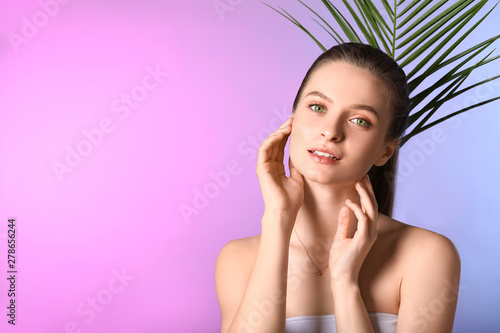 Beautiful young woman with ...