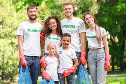 Volunteers gathering garbag...