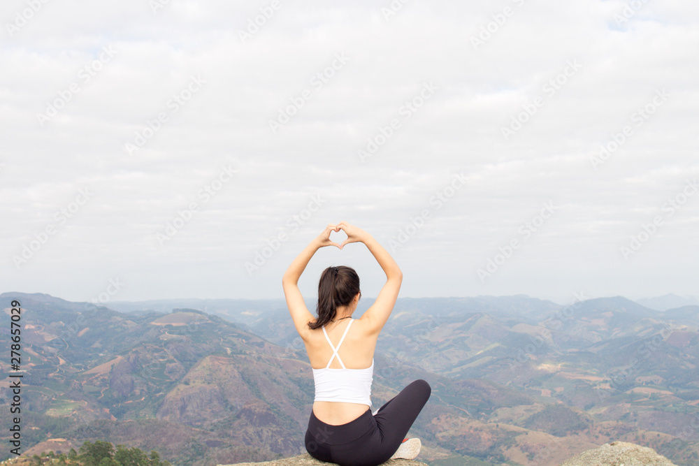 young woman doing yoga