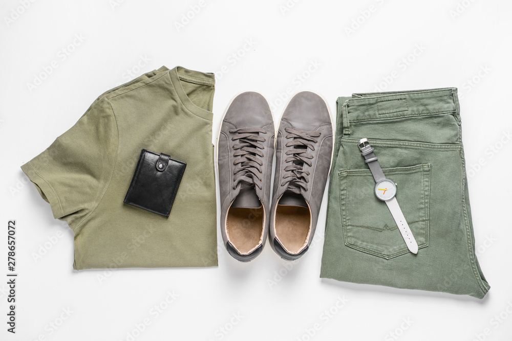 Stylish male look with jeans clothes on white background Stylish male look with jeans clothes on white background