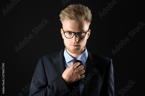 Stylish young man in formal...