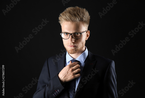 Stylish young man in formal...