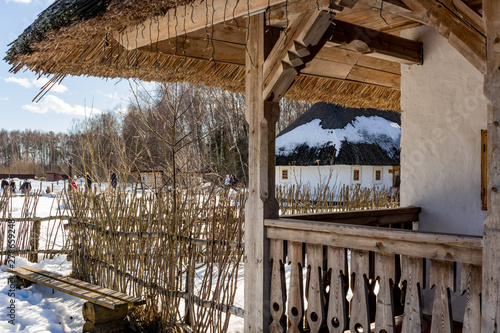 Traditional Russian and Ukrainian hut in the ethnographic village Etnomir. Kaluzhskiy region, Russia photo