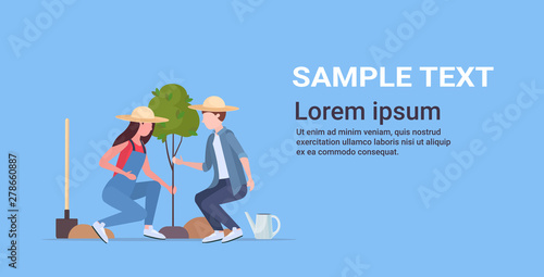 farmers couple planting young tree gardeners woman man working in garden agricultural planting gardening eco farming concept flat full length horizontal copy space