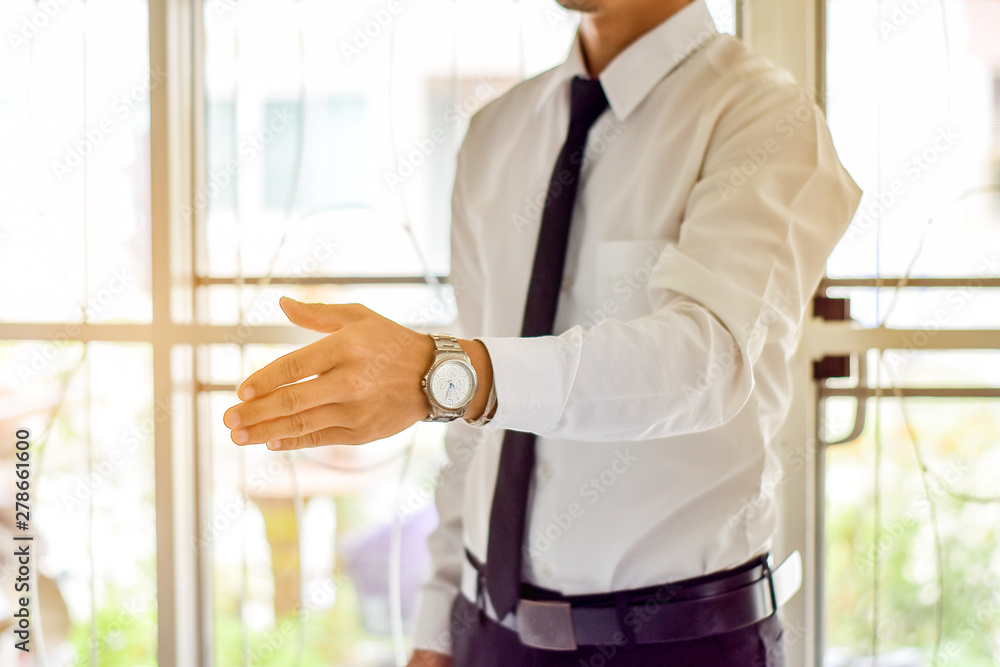 business man with an open hand ready to seal a deal business man with an open hand ready to seal a deal