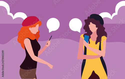 two women using smartphone talking