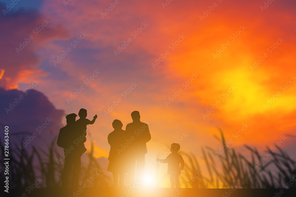 Silhouette of Grandfather grandmother granddaughter and grandchild playing and walking evening sunset background, Happy family concept