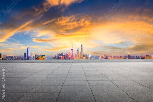 Empty square floor and modern city skyline in Shanghai at sunset,high angle view