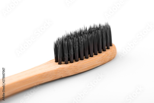 Bamboo toothbrush isolated on white background