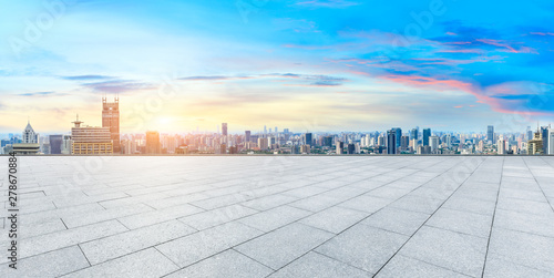 Empty square floor and modern city skyline in Shanghai at sunset,high angle view