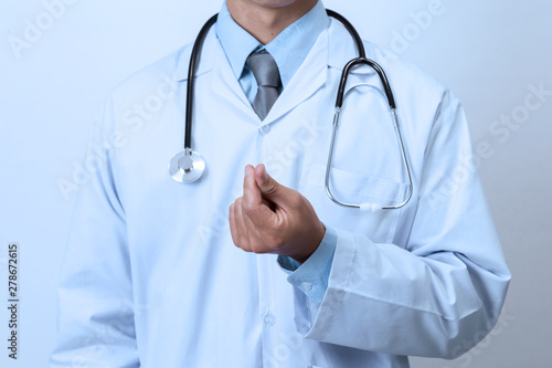 Doctor showing love sign