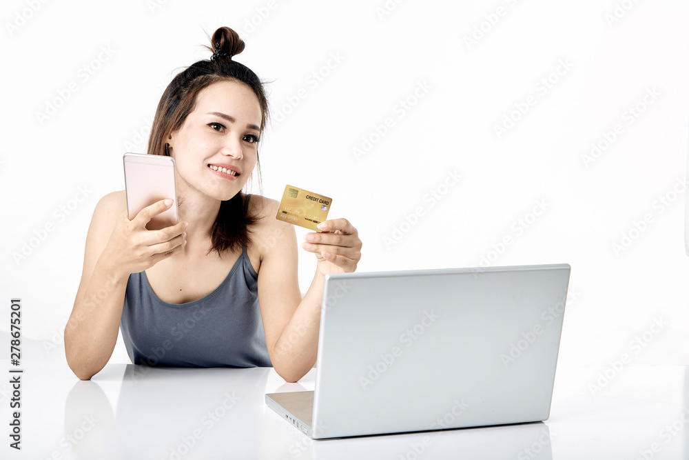 Thai woman shopping online studio shot Thai woman shopping online studio shot
