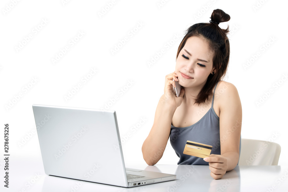 Thai woman shopping online studio shot Thai woman shopping online studio shot