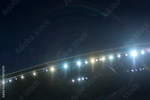 Stadium lights against blue sky © salajean