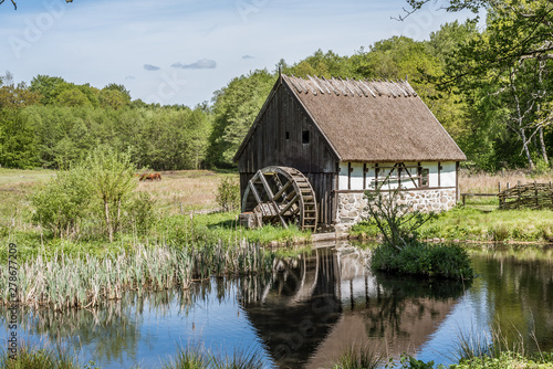 Old Watermill in an agrarian landscape at Kulturens Östarp, a genuine open air museum in Blenterp, Sweden © Stig Alenas