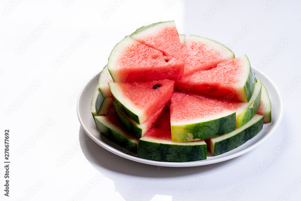 Slices of fresh watermelon on white marble background Slices of fresh watermelon on white marble background