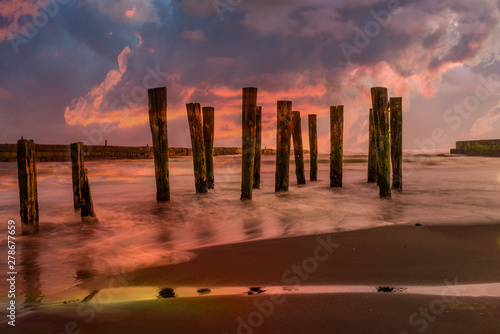The remains of the decaying jetty at Patea in New Zealand