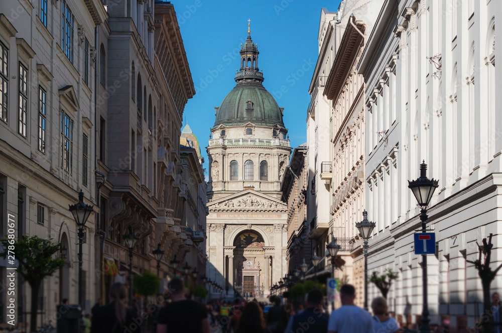 Crowded tourist at Zrinyi Utca street with Saint Stephen`s Basilica in Budapest, Hungary