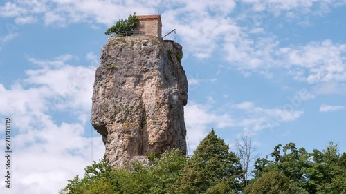 Timelapse video of touristic landmark Katskhi Pillar with ancient Orthodox church on top in Chiatura, Georgia
