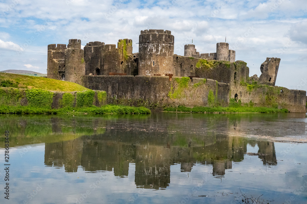 Caerphilly Castle and reflections in the moat
