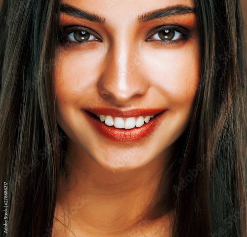 cute happy young indian woman in studio close up smiling, fashion beauty